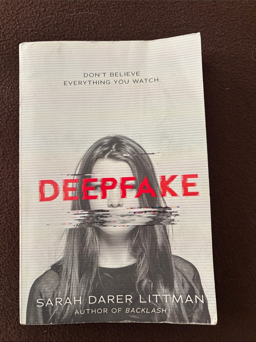 Deepfake Scholastic White Paperback Back Cover by Sarah Darer Littman